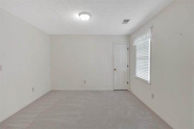 4181 Singing Post Ln NE, Roswell, GA 30075 - spare room with light colored carpet and baseboards