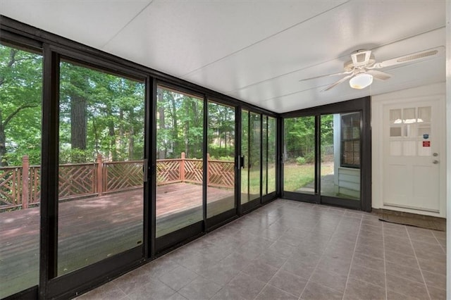 4181 Singing Post Ln NE, Roswell, GA 30075 - unfurnished sunroom featuring a ceiling fan and vaulted ceiling