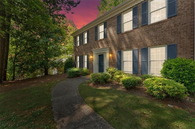 4181 Singing Post Ln NE, Roswell, GA 30075 - colonial inspired home with brick siding and a lawn