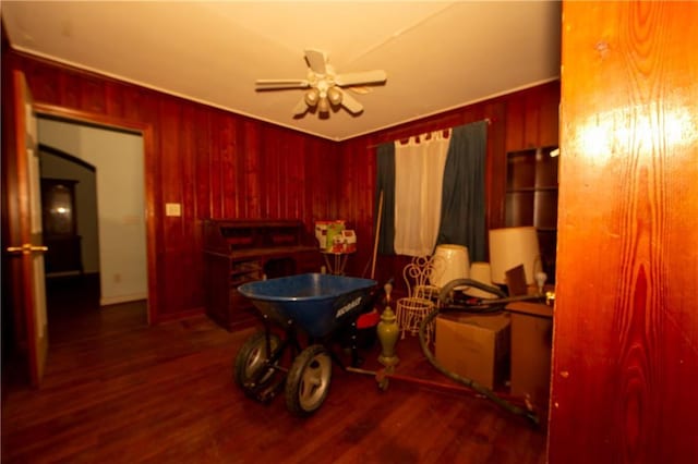 1398 Christmas Ln NE, Atlanta, GA 30329 - dining room featuring wood finished floors, wood walls, and a ceiling fan