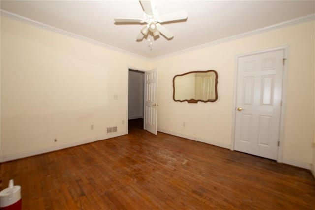 1398 Christmas Ln NE, Atlanta, GA 30329 - unfurnished bedroom featuring crown molding, wood finished floors, and baseboards