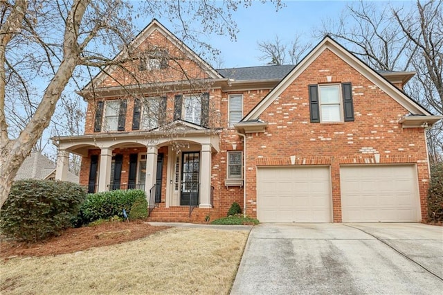 view of front of property featuring a garage and covered porch