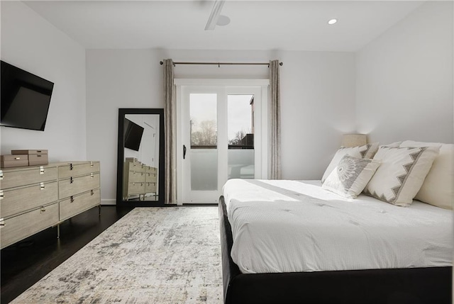 bedroom with recessed lighting, baseboards, and dark wood finished floors