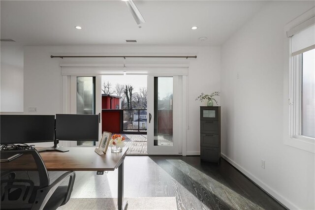 home office featuring dark wood-type flooring