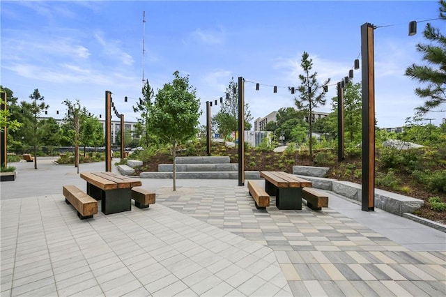 view of property's community with a patio area