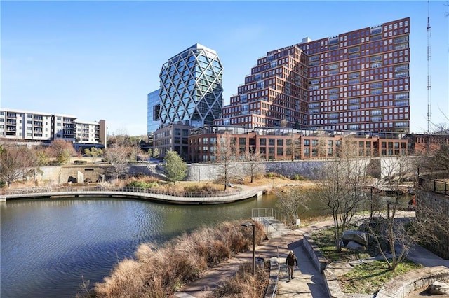 view of property's community with a city view and a water view