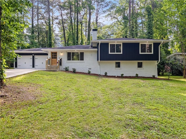 466 Thackery Pl SW, Atlanta, GA 30311 - tri-level home featuring a chimney, a front yard, driveway, and brick siding