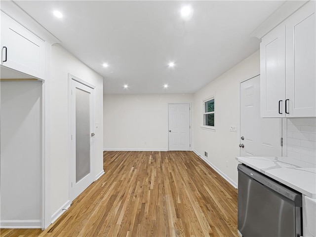 466 Thackery Pl SW, Atlanta, GA 30311 - unfurnished living room featuring light wood-style flooring, baseboards, and recessed lighting
