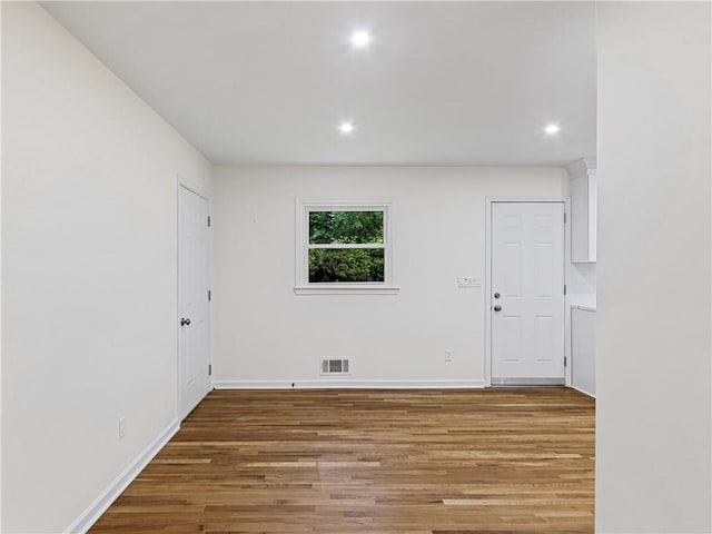 466 Thackery Pl SW, Atlanta, GA 30311 - empty room with wood finished floors, recessed lighting, and baseboards