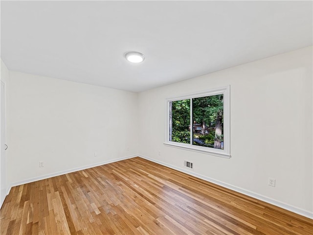 466 Thackery Pl SW, Atlanta, GA 30311 - spare room featuring light wood finished floors and baseboards