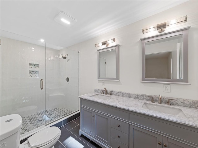 466 Thackery Pl SW, Atlanta, GA 30311 - bathroom featuring toilet, a shower stall, double vanity, and tile patterned flooring