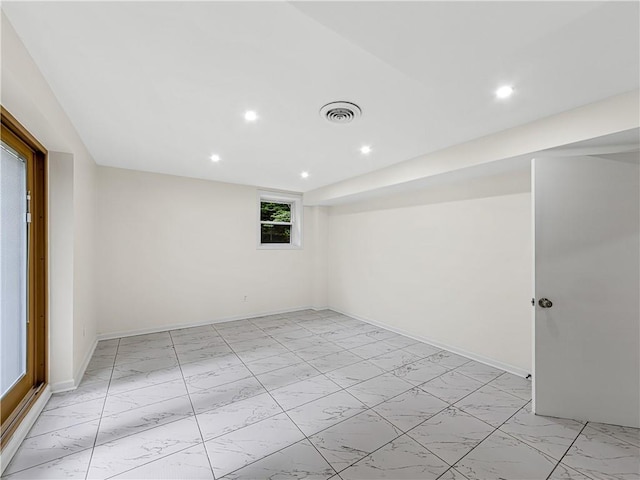466 Thackery Pl SW, Atlanta, GA 30311 - empty room featuring light marble finish floors, recessed lighting, and baseboards