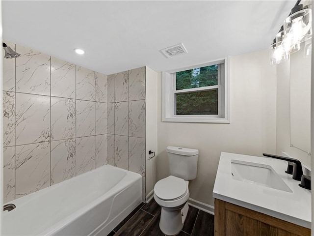 466 Thackery Pl SW, Atlanta, GA 30311 - full bath with toilet, vanity, wood finished floors, bathtub / shower combination, and recessed lighting