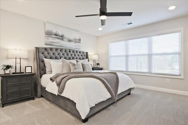 carpeted bedroom with baseboards, a ceiling fan, recessed lighting, and visible vents