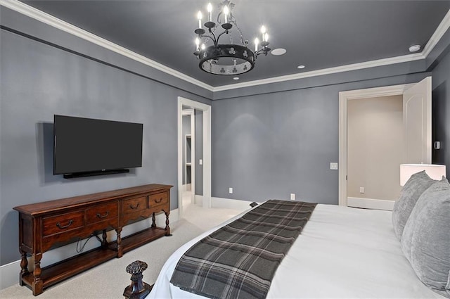 carpeted bedroom featuring a chandelier, ornamental molding, and baseboards