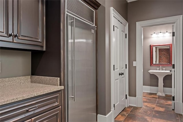 bathroom featuring baseboards