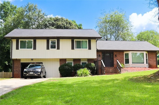 split level home featuring a carport and a front lawn