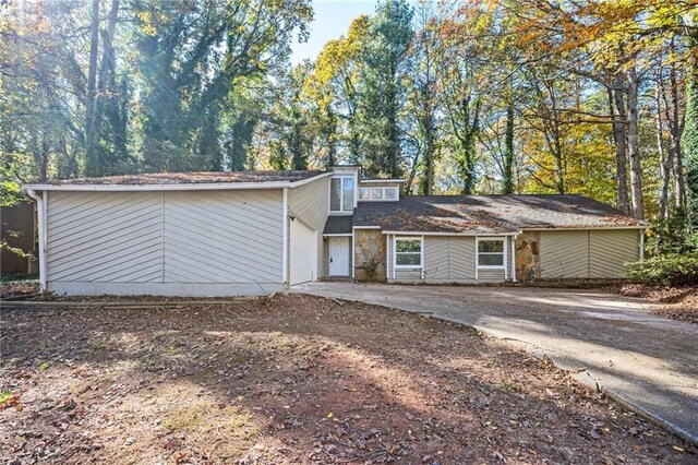 front facade with a garage