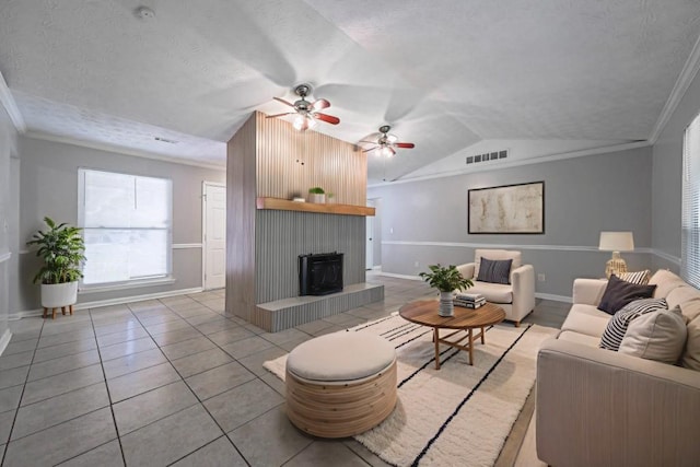 2173 Martin Way, Jonesboro, GA 30236 - living room featuring light tile patterned flooring, baseboards, lofted ceiling, ornamental molding, and ceiling fan