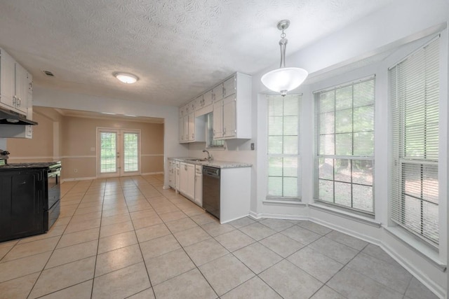 2173 Martin Way, Jonesboro, GA 30236 - kitchen featuring black appliances, light tile patterned flooring, light countertops, under cabinet range hood, and a textured ceiling