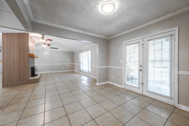 2173 Martin Way, Jonesboro, GA 30236 - unfurnished living room with light tile patterned floors, ceiling fan, a fireplace with raised hearth, french doors, and a textured ceiling