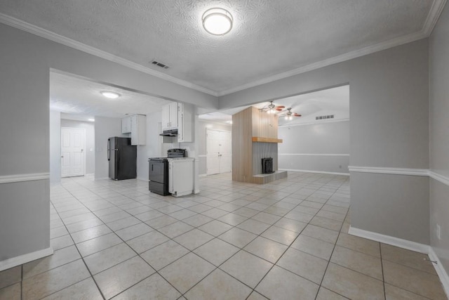 2173 Martin Way, Jonesboro, GA 30236 - unfurnished living room featuring a ceiling fan, a textured ceiling, light tile patterned floors, a fireplace with raised hearth, and baseboards