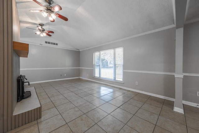 2173 Martin Way, Jonesboro, GA 30236 - unfurnished living room featuring a ceiling fan, vaulted ceiling, light tile patterned floors, crown molding, and baseboards