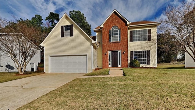 view of property with a front lawn and a garage