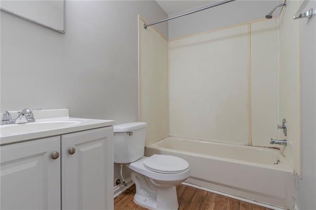 4342 Lincolndale Dr, Ellenwood, GA 30294 - bathroom featuring wood finished floors, toilet, vanity, and shower / bathtub combination