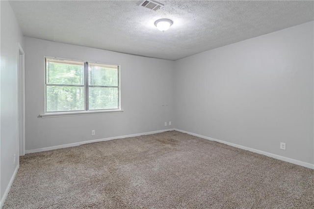 4342 Lincolndale Dr, Ellenwood, GA 30294 - carpeted spare room with a textured ceiling and baseboards