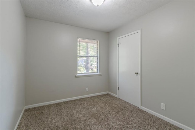 4342 Lincolndale Dr, Ellenwood, GA 30294 - unfurnished room with carpet, baseboards, and a textured ceiling