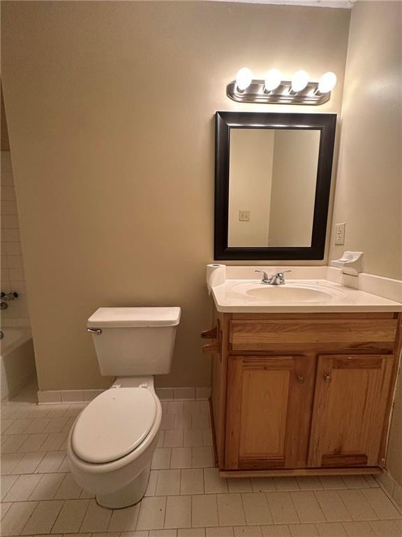 213 Peartree Ln, Riverdale, GA 30274 - full bath with tile patterned flooring, toilet, vanity, and baseboards