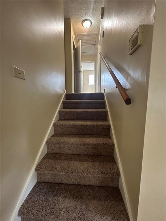 213 Peartree Ln, Riverdale, GA 30274 - stairs with an AC wall unit, carpet floors, and baseboards