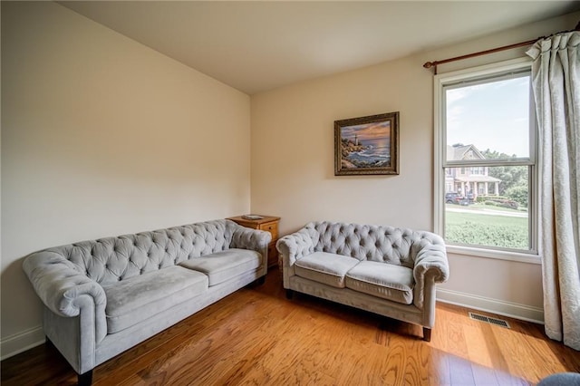 living room with light hardwood / wood-style floors