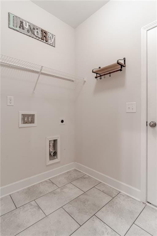 laundry room featuring hookup for an electric dryer, washer hookup, and light tile patterned floors