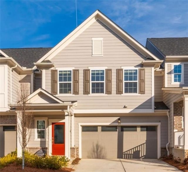 view of front of property featuring a garage