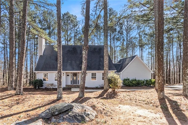 view of front of property featuring a chimney