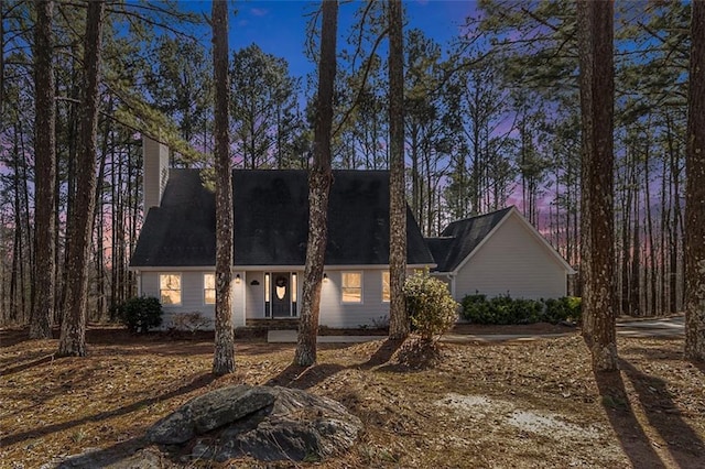 view of front of property with a chimney