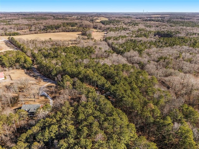 aerial view featuring a view of trees