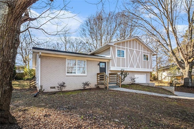 view of front of property with a garage