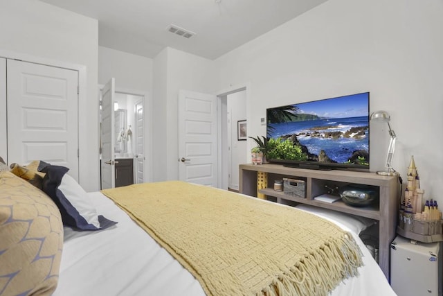 bedroom featuring ensuite bathroom