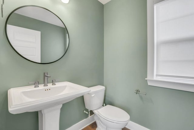 bathroom with sink and toilet