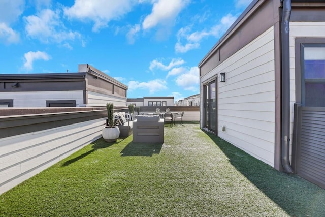 view of yard with outdoor lounge area