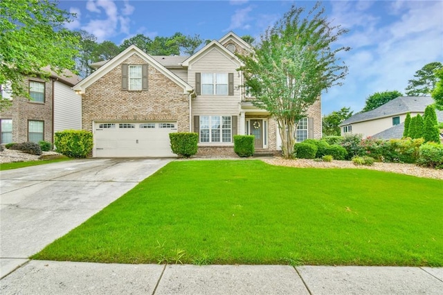 3060 Mccannon Mill Dr, Dacula, GA 30019 - view of front of house with brick siding, a garage, a front lawn, and concrete driveway