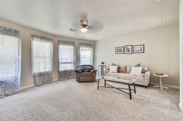 3060 Mccannon Mill Dr, Dacula, GA 30019 - carpeted living area featuring a ceiling fan and baseboards