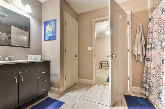 3060 Mccannon Mill Dr, Dacula, GA 30019 - full bathroom featuring vanity, baseboards, and tile patterned flooring