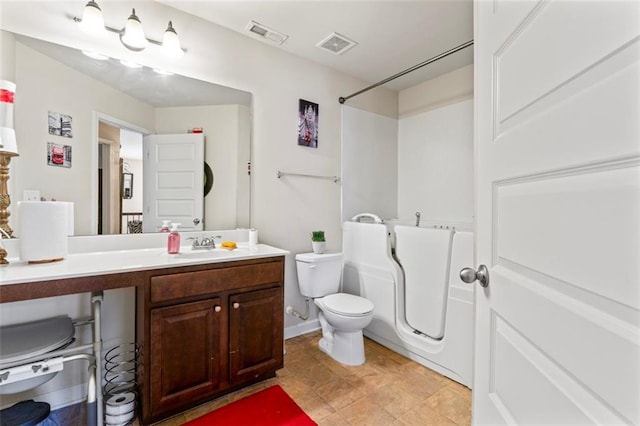 full bathroom featuring vanity, toilet, and shower / tub combination