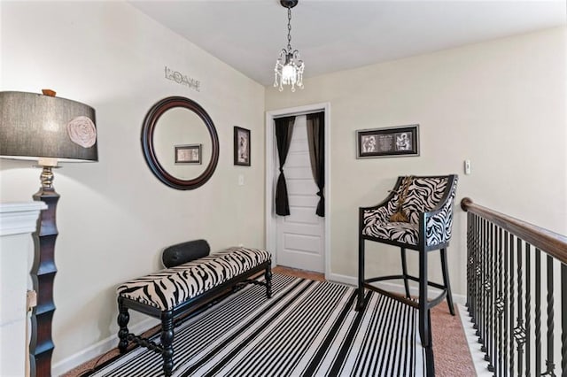 interior space with carpet and an inviting chandelier