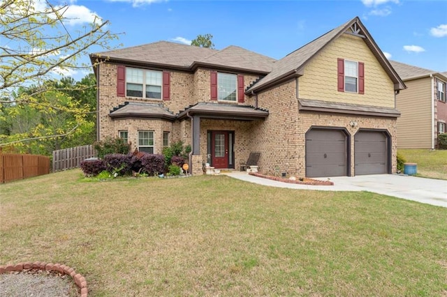 view of front of home featuring a front lawn and a garage