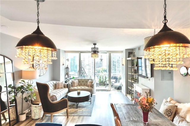 3338 Peachtree Rd NE Unit 1507, Atlanta, GA 30326 - living area with wood finished floors, a chandelier, and ceiling fan